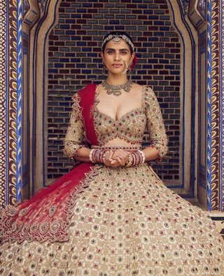 Gold Bridal Tissue Lehenga Choli Set by Nitika Gujral available on Indiaspopup.com