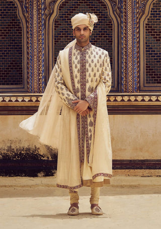 Beige Zardozi Embroidery Sherwani Set by Nitika Gujral Men available on Indiaspopup.com