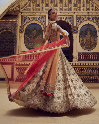 Gold Bridal Lehenga Choli Set by Nitika Gujral available on Indiaspopup.com