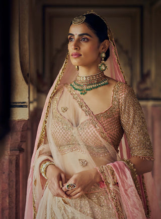 Peach Tulle Lehenga Choli Set by Nitika Gujral available on Indiaspopup.com