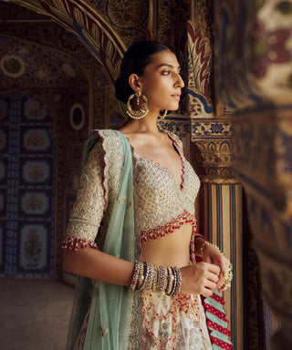 Silver Tissue Lehenga Choli Set by Nitika Gujral available on Indiaspopup.com