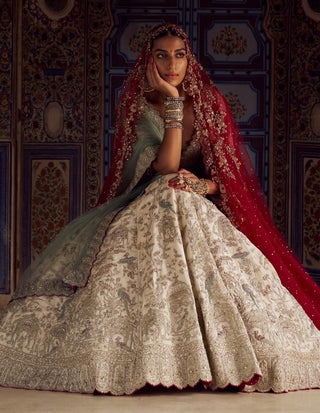 Silver Tissue Lehenga Choli Set by Nitika Gujral available on Indiaspopup.com