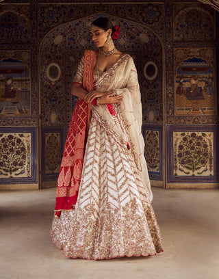Ivory Organza Lehenga Choli Set by Nitika Gujral available on Indiaspopup.com
