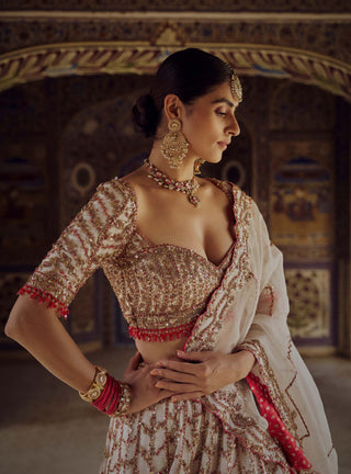 Ivory Organza Lehenga Choli Set by Nitika Gujral available on Indiaspopup.com