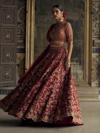 Deep Red Bridal Silk Lehenga Set by Nitika Gujral available on Indiaspopup.com