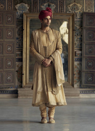 Gold Matka Silk Angrakha Sherwani Set by Nitika Gujral Men available on Indiaspopup.com