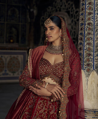 Red Antique Kasab Lehenga Set by Nitika Gujral available on Indiaspopup.com
