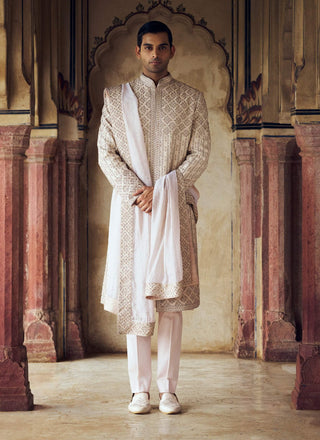 Blush Raw Silk Sherwani Set by Nitika Gujral Men available on Indiaspopup.com