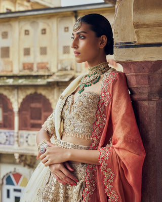Gold Raw Silk Lehenga Choli Set by Nitika Gujral available on Indiaspopup.com