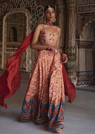 Saima Sunset Orange Sharara Set by Kalista available on Indiaspopup