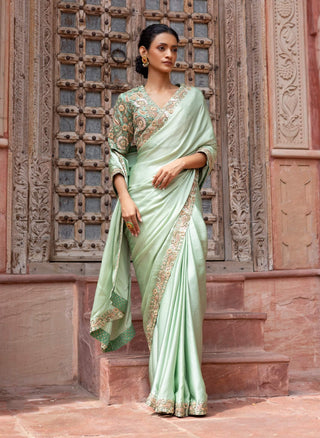 Mint green paisley embroidered sari and blouse