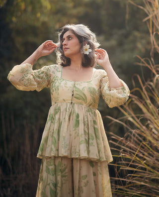 Pistachio green and ivory peplum and palazzo set