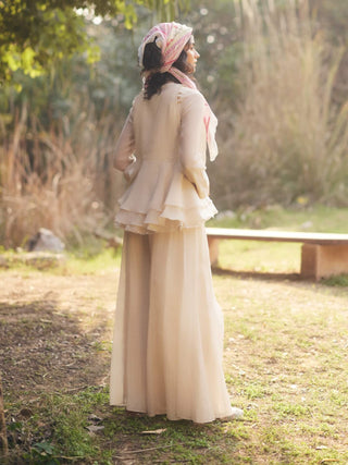 Ivory Peplum Jacket And Palazzo Set by Paulmi & Harsh available on Indiaspopup.com
