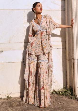 Nirvi Ivory Printed Peplum And Gharara by Seema Thukral available on Indiaspopup.com
