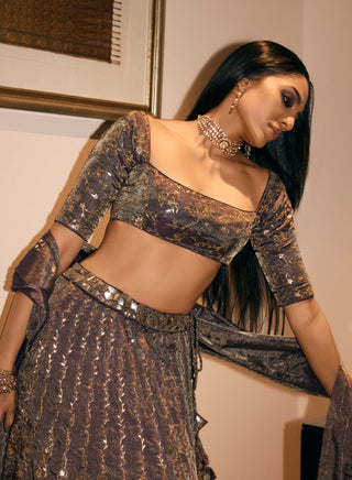 Baigani Metallic Lehenga Set by Punit Balana available on Indiaspopup.com