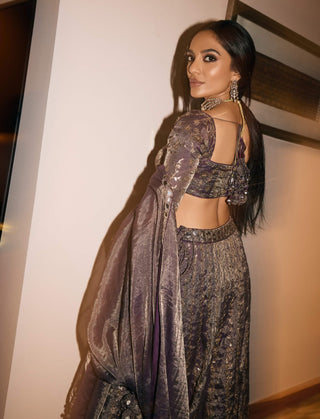Baigani Metallic Lehenga Set by Punit Balana available on Indiaspopup.com