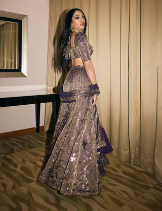 Baigani Metallic Lehenga Set by Punit Balana available on Indiaspopup.com