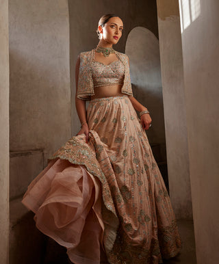 Peach Lehenga And Short Jacket Set by Tamanna Punjabi Kapoor available on Indiaspopup.com