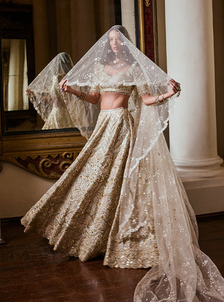 Cream Gold Highlight Lehenga Set by Tamanna Punjabi Kapoor available on Indiaspopup.com