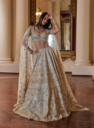 Cream Gold Highlight Lehenga Set by Tamanna Punjabi Kapoor available on Indiaspopup.com