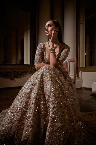 Dusky Rose Mirror Lehenga Set by Tamanna Punjabi Kapoor available on Indiaspopup.com