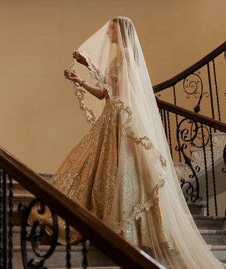 Ivory Multi Embroidered Lehenga Set by Tamanna Punjabi Kapoor available on Indiaspopup.com