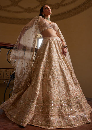 Peach Self Embroidered Mirror Lehenga Set by Tamanna Punjabi Kapoor available on Indiaspopup.com
