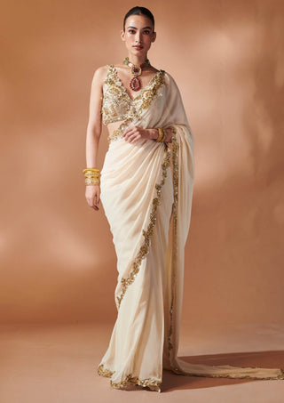 Ivory And Gold Stitched Sari And Blouse by Tamanna Punjabi Kapoor, available on Indiaspopup.com