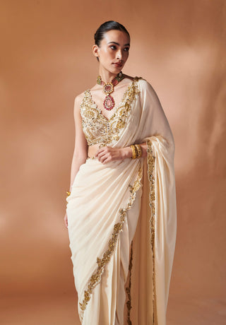 Ivory And Gold Stitched Sari And Blouse by Tamanna Punjabi Kapoor, available on Indiaspopup.com