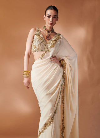 Ivory And Gold Stitched Sari And Blouse by Tamanna Punjabi Kapoor, available on Indiaspopup.com