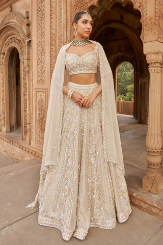 Ivory Jashnaa Lehenga Set by Nidhika Shekhar available on Indiaspopup.com
