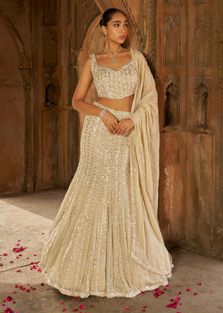 Golden Jashna-E-Dill Lehenga Set by Nidhika Shekhar available on Indiaspopup.com