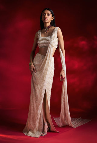 Viola Ivory Net Sari And Blouse by Charu & Vasundhara available on Indiaspopup.com
