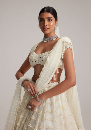 Off-white mirror and pearl drop bridal lehenga set