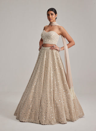Light beige dense mirror and pearl corset lehenga set
