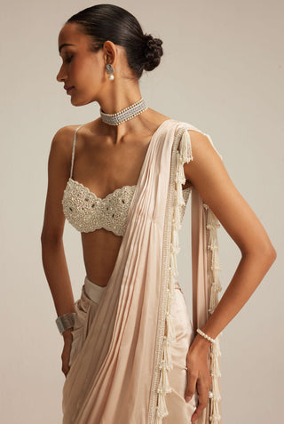 Light beige draped sari and blouse