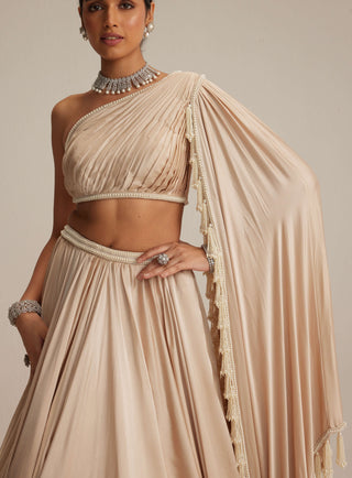 Light beige satin lehenga and attached trail set