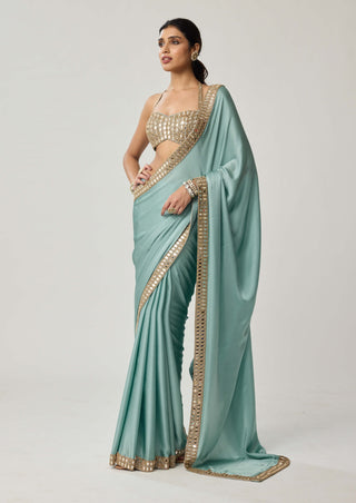 Powder blue satin sari and halter blouse