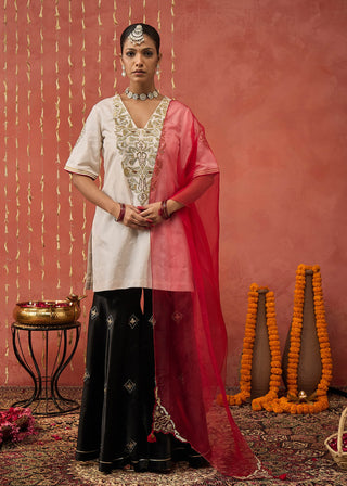 Ivory Roli Silk Embroidered Short Kurta And Sharara Set by Shivani Bhargava available on Indiaspopup.com