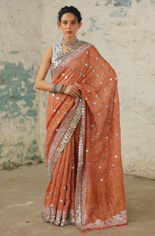 Copper Rust Sari And Unstitched Blouse by Saksham & Neharicka available on Indiaspopup.com