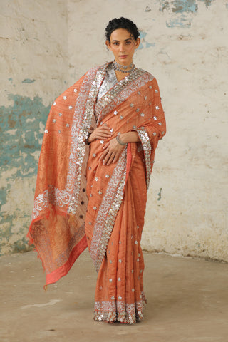 Copper Rust Sari And Unstitched Blouse by Saksham & Neharicka available on Indiaspopup.com