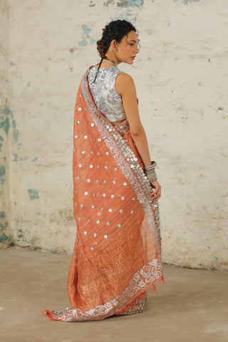 Copper Rust Sari And Unstitched Blouse by Saksham & Neharicka available on Indiaspopup.com