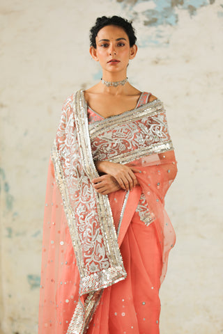 Coral Organza Sari And Unstitched Blouse by Saksham & Neharicka available on Indiaspopup.com