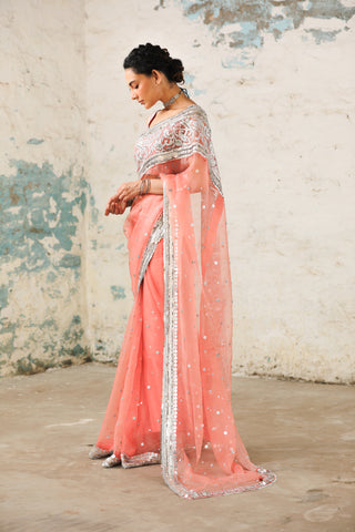 Coral Organza Sari And Unstitched Blouse by Saksham & Neharicka available on Indiaspopup.com