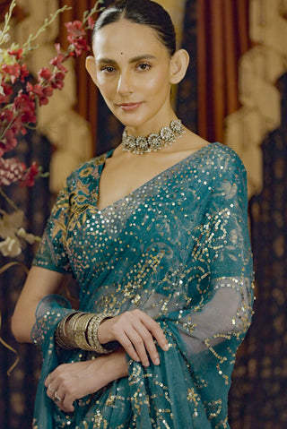 Moonray Teal Embroidered Sari And Blouse by Saksham & Neharicka available on Indiaspopup