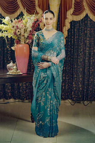 Moonray Teal Embroidered Sari And Blouse by Saksham & Neharicka available on Indiaspopup