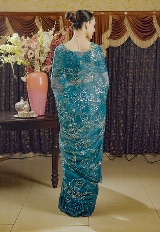Moonray Teal Embroidered Sari And Blouse by Saksham & Neharicka available on Indiaspopup