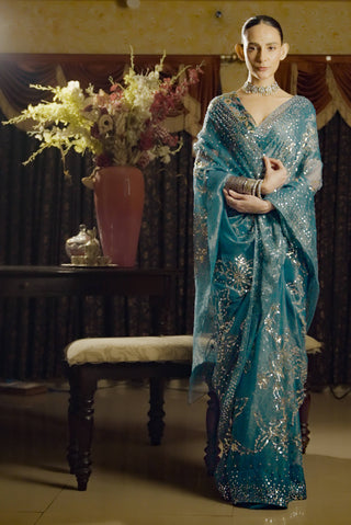Moonray Teal Embroidered Sari And Blouse by Saksham & Neharicka available on Indiaspopup