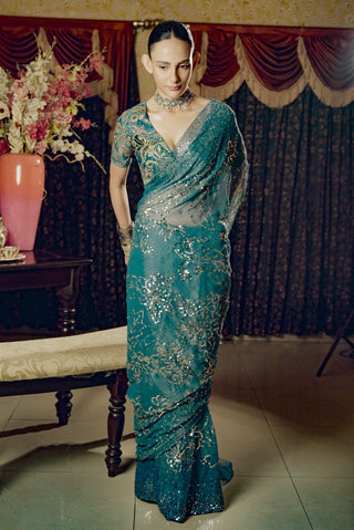 Moonray Teal Embroidered Sari And Blouse by Saksham & Neharicka available on Indiaspopup