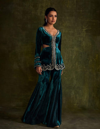 Turquoise Velvet Cut-Out Peplum And Flared Pants by Sanya Gulati available on Indiaspopup